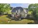 Large fenced in yard features a lush lawn and plenty of space for relaxing and entertaining at 1213 Blue Springs Dr, Loganville, GA 30052