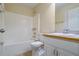 Functional bathroom with tub-shower combo, single sink vanity and neutral decor at 1213 Blue Springs Dr, Loganville, GA 30052