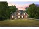 Charming two-story brick home with lush green lawn and mature trees at 1213 Blue Springs Dr, Loganville, GA 30052