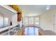 Well-lit kitchen showcases stone backsplash, stainless steel sink, and breakfast area with large windows at 1213 Blue Springs Dr, Loganville, GA 30052