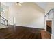 Spacious living room with hardwood floors and a fireplace at 1213 Blue Springs Dr, Loganville, GA 30052