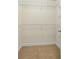 Bright walk-in closet with neutral walls and wire shelving for organization at 1213 Blue Springs Dr, Loganville, GA 30052