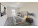 Cozy bedroom with large window, neutral walls, and stylish decor at 14 Borland Rd, Villa Rica, GA 30180