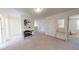 Second floor loft area with neutral carpeting, furniture, and natural light at 14 Borland Rd, Villa Rica, GA 30180
