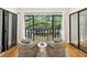 Cozy balcony featuring comfortable seating and serene views of the water at 23310 Plantation Ne Dr, Atlanta, GA 30324