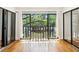 Bright empty balcony with scenic treetop and water views at 23310 Plantation Ne Dr, Atlanta, GA 30324