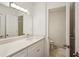 Clean, well-lit bathroom with modern vanity, updated lighting, and a separate toilet room at 23310 Plantation Ne Dr, Atlanta, GA 30324