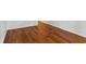 Spacious room showing gleaming hardwood floors and ample room for furniture at 23310 Plantation Ne Dr, Atlanta, GA 30324