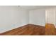 Cozy room features hardwood floors and white walls, awaiting your personal touch at 23310 Plantation Ne Dr, Atlanta, GA 30324