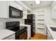 Clean white kitchen with modern appliances and ample storage space at 23310 Plantation Ne Dr, Atlanta, GA 30324