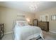 Bedroom features natural light, a chandelier and cozy furniture at 2566 Garrison Sw, Marietta, GA 30064