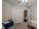 A cozy bedroom has double door closet and is brightly lit at 2566 Garrison Sw, Marietta, GA 30064