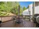Outdoor deck with seating area perfect for entertaining and enjoying backyard views at 2566 Garrison Sw, Marietta, GA 30064