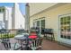 Rear wooden deck featuring multiple grills and seating for four at 2566 Garrison Sw, Marietta, GA 30064