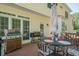 Rear wooden deck with seating for four and three barbecue grills at 2566 Garrison Sw, Marietta, GA 30064