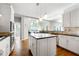 Spacious kitchen with granite countertops and island at 4415 Dorset Ln, Suwanee, GA 30024
