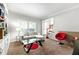 Inviting living room with plush carpeting and large window at 4415 Dorset Ln, Suwanee, GA 30024