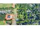 An aerial shot highlighting the lot near the road and neighborhood at 5690 Abbotts Bridge Rd, Johns Creek, GA 30097