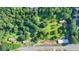 Sprawling lot with mature trees and landscaping in established neighborhood close to the city at 5690 Abbotts Bridge Rd, Johns Creek, GA 30097