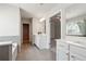 Bright bathroom with double sink vanity and access to the tub, shower and walk-in closet at 787 Belrose Dr, Smyrna, GA 30080