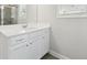 Modern bathroom with white cabinets, granite countertops and chrome hardware at 787 Belrose Dr, Smyrna, GA 30080