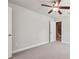 Bedroom with neutral carpet, ceiling fan and view into the stairway at 787 Belrose Dr, Smyrna, GA 30080