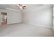 Large bedroom with tray ceiling and neutral carpet at 787 Belrose Dr, Smyrna, GA 30080