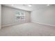 Bonus room with neutral carpet and light from the window at 787 Belrose Dr, Smyrna, GA 30080