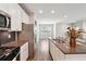 Kitchen and dining area with stainless appliances and granite counters at 787 Belrose Dr, Smyrna, GA 30080