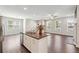 Kitchen with granite island opens to dining and living spaces at 787 Belrose Dr, Smyrna, GA 30080