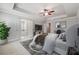 Spacious main bedroom with tray ceiling, ceiling fan, and ensuite bathroom access at 787 Belrose Dr, Smyrna, GA 30080