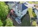 Aerial view of home with back deck and patio space, perfect for entertaining at 5093 Heartland Trl, Hoschton, GA 30548