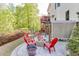 Spacious backyard featuring a fire pit area and deck for outdoor enjoyment at 5093 Heartland Trl, Hoschton, GA 30548
