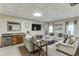 Spacious living area featuring modern decor and comfortable seating at 5093 Heartland Trl, Hoschton, GA 30548