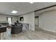 Spacious recreation room area with a view of the office area at 5093 Heartland Trl, Hoschton, GA 30548
