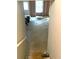 View of a basement with a window, an exterior door, and concrete flooring at 4346 Traipse Path, Ellenwood, GA 30294