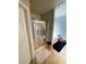 Bathroom featuring a glass-enclosed shower and separate soaking tub at 4346 Traipse Path, Ellenwood, GA 30294