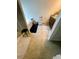 Well-lit bathroom with a soaking tub, shower, vanity with a sink, and vanity storage at 4346 Traipse Path, Ellenwood, GA 30294