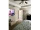 Comfortable bedroom with a TV and door to another room at 4346 Traipse Path, Ellenwood, GA 30294