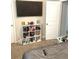 Bedroom with storage unit and television at 4346 Traipse Path, Ellenwood, GA 30294
