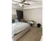 Relaxing bedroom showcasing a comfortable bed, neutral colors, and a ceiling fan at 4346 Traipse Path, Ellenwood, GA 30294
