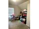 Bedroom being used for storage with window and neutral walls at 4346 Traipse Path, Ellenwood, GA 30294