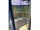Covered back deck overlooking a lush backyard and trees at 4346 Traipse Path, Ellenwood, GA 30294