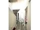 Bright hallway features modern wood-look flooring and neutral paint, leading to various rooms at 4346 Traipse Path, Ellenwood, GA 30294