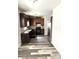 Modern kitchen with granite counters, stainless steel appliances and dark cabinets at 4346 Traipse Path, Ellenwood, GA 30294
