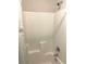 Shower with white walls and chrome hardware at 4346 Traipse Path, Ellenwood, GA 30294