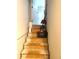 An unfinished staircase to the basement needs flooring, but is dry and solid at 4346 Traipse Path, Ellenwood, GA 30294