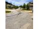View of the street in front of the house, showing other neighborhood houses and cars at 4346 Traipse Path, Ellenwood, GA 30294