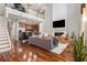 Open-concept home featuring a fireplace and high ceilings at 6023 Brookside Oak Cir, Norcross, GA 30093