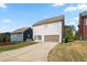 Spacious backyard with a two-car garage and a long driveway at 1536 Drew Nw Dr, Atlanta, GA 30318